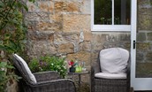 Priory Cottage - comfortable outdoor seating for guests to relax and enjoy a glass of wine