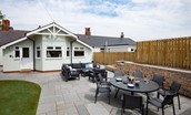Driftwood Bamburgh - enclosed garden to the rear of the property with patio for outdoor dining