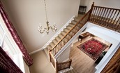 Wark Farmhouse - the staircase leading from the central hallway on the ground floor