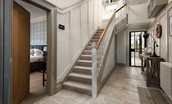 Caste View, Bamburgh - entrance hall and staircase with ground floor bedrooms to the left and right