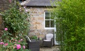 Priory Cottage - tranquil outdoor seating area for guests