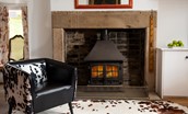 Walltown Farm Cottage - cosy log burner in an impressive inglenook in the sitting room