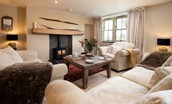 Goose Cottage - cosy sitting room with a calming interior