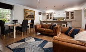 Cuthbert House - open plan sitting room with two two seater sofas