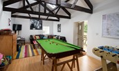 Moo House - The Cow Shed games room with pool table, keyboard, football table and TV