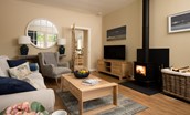 The Coach House, Kingston - sitting room with wood burning stove