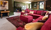 Fairnilee House - cinema room with huge corner sofa, open log fire and 3/4-size snooker table