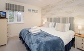 Hastings House - bedroom one with super king size bed that can be configured as a twin upon request