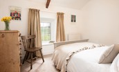 Appletree Cottage - bedroom two with double bed and chest of drawers