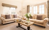 Bracken Lodge - sink into the large buttery soft sofas