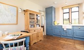 Lindisfarne View - the kitchen has a rustic vibe with wooden floor boards and pine dresser