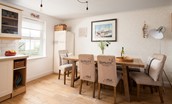 Nook - dining table in the kitchen with 4 chairs and bench seating