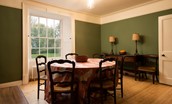Church House - the dining room seats up to ten guests and is furnished with a collection of antique pieces