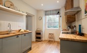 Trouthouse - well-equipped Shaker-style kitchen and open shelving