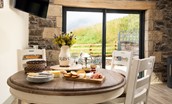 The Hemmel at West Moneylaws - the dining table for four with views to the countryside