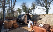 East Lodge Home Farm - outdoor dining furniture, sauna pod and wood-fired cedar wood hot-tub in the garden