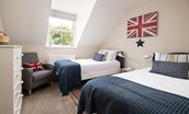 Partridge Lodge - bedroom four with two full size single beds and views to the rear gardens