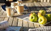 Bee Cottage - enjoy breakfast on the patio while planning the day's adventure