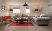 Farm Cottage - sitting room with two sofas, armchair and coffee table