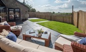 Sunwick Cottage - relax in the garden on the smart rattan outdoor furniture