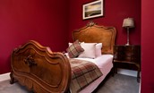 South Lodge, Twizell Estate - bedroom one with antique bed