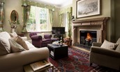 Birks Stable Cottage - three seater sofa, two armchairs, Smart TV and open fire in the sitting room