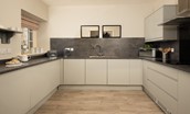 Farm Cottage - the kitchen with smart integrated units and storage space