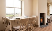 Bee Cottage - dinning table seating four guests and offering fabulous views across to Holy Island