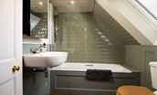 Cairnbank House - bedroom three en suite bathroom with bath and shower over