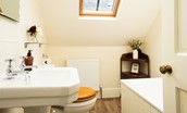 Birks Stable Cottage - family bathroom on the first floor with bath, basin and WC