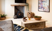 Goose Cottage - snug with flatscreen TV mounted above the cosy wood burner