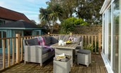 Friars Farm Cottage - the raised deck in the sunny south-facing garden is the perfect spot for a morning coffee