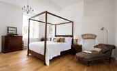 Number One Clayport Street - bedroom one on first floor with four-poster bed and chaise longue