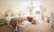 The Tower, Keith Marischal - light-filled bedroom three with twin beds and large window to take in the sweeping views