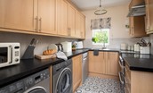 Kilham Cottage - small but well-equipped kitchen including washing machine and dryer