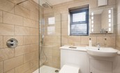The Granary at Rothley East Shield - downstairs bathroom with walk-in shower featuring a rainforest shower head and separate mixer