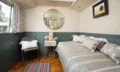 The Showman's Wagon - bedroom two has a daybed which converts to a single bed or low twin beds