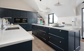 Seaside House - large well-equipped kitchen with double oven, induction hob and large 'coffee bar' cupboard