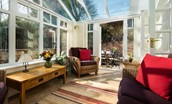 Rose Cottage, Huggate - the conservatory with direct access to the courtyard and gardens beyond