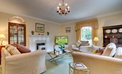 The Eslington Lodge - sitting room with comfy seating