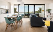 2 The Bay, Coldingham - the light-filled living space continues the coastal theme indoors with its distinct surf vibe