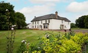 Wark Farmhouse - large farmhouse with lawn garden and parking area