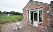 The Bothy at Dryburgh - the patio with views over the surrounding farmland
