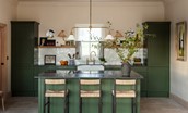 The Old Rectory - kitchen island with three bar stools