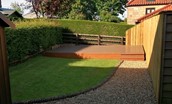 The Haven - rear garden with decking and lawn area