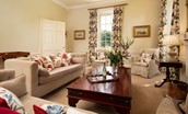 East House - enjoy a glass of wine by the wood burning stove in the elegant drawing room