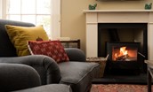 Seaview House - wood burner warms the sitting room