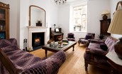 Number One Clayport Street - the drawing room with wood-burning stove and ample seating