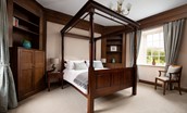 Fairnington East Wing - bedroom one with an impressive four poster bed