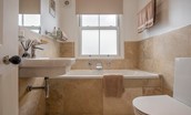 Number 109 - first floor bathroom with full size bath, sink and WC